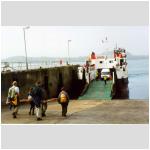The cross and coach board the Iona Ferry.